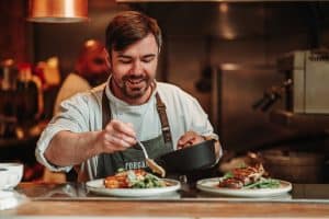 chef plating food at forgans